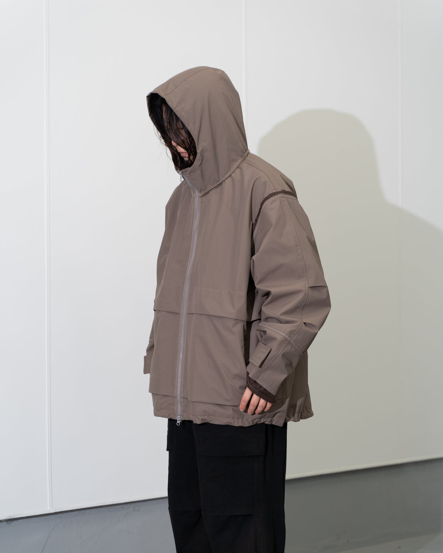 REIMAGINED POSTMAN HOODED JACKET - BROWN