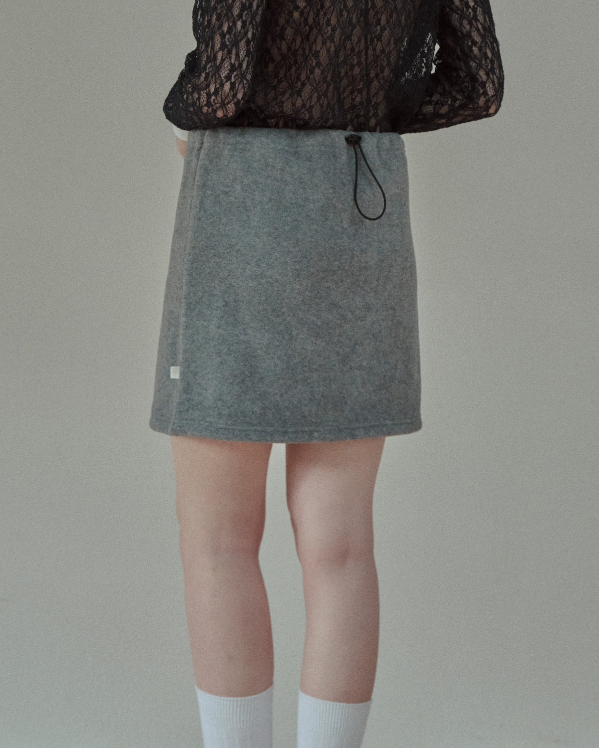 FLEECE ZIP MINI SKIRT - BLACK