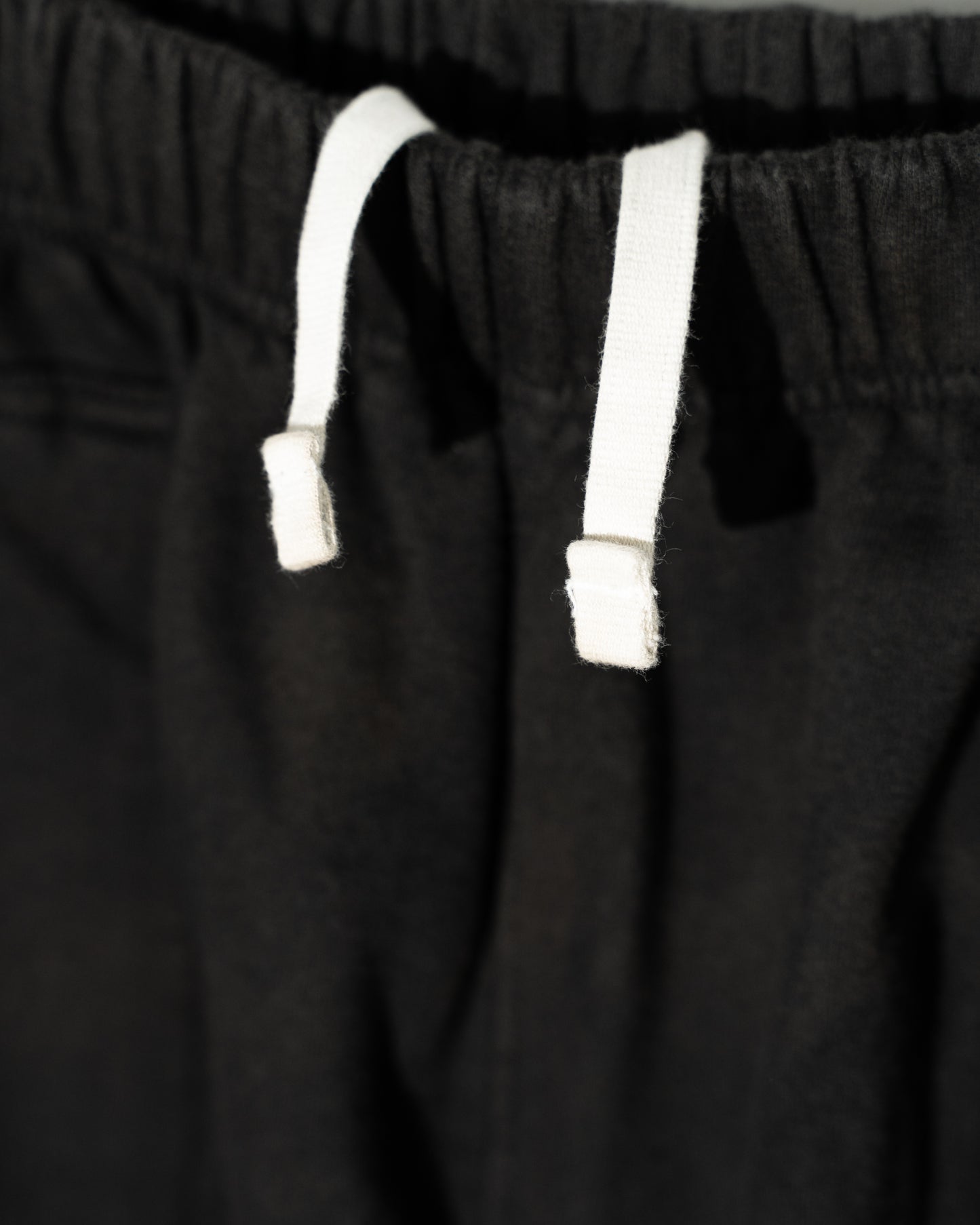 REIMAGINED NEWBOY FLEECE-LINED SWEATPANTS - BLEACHED BLACK