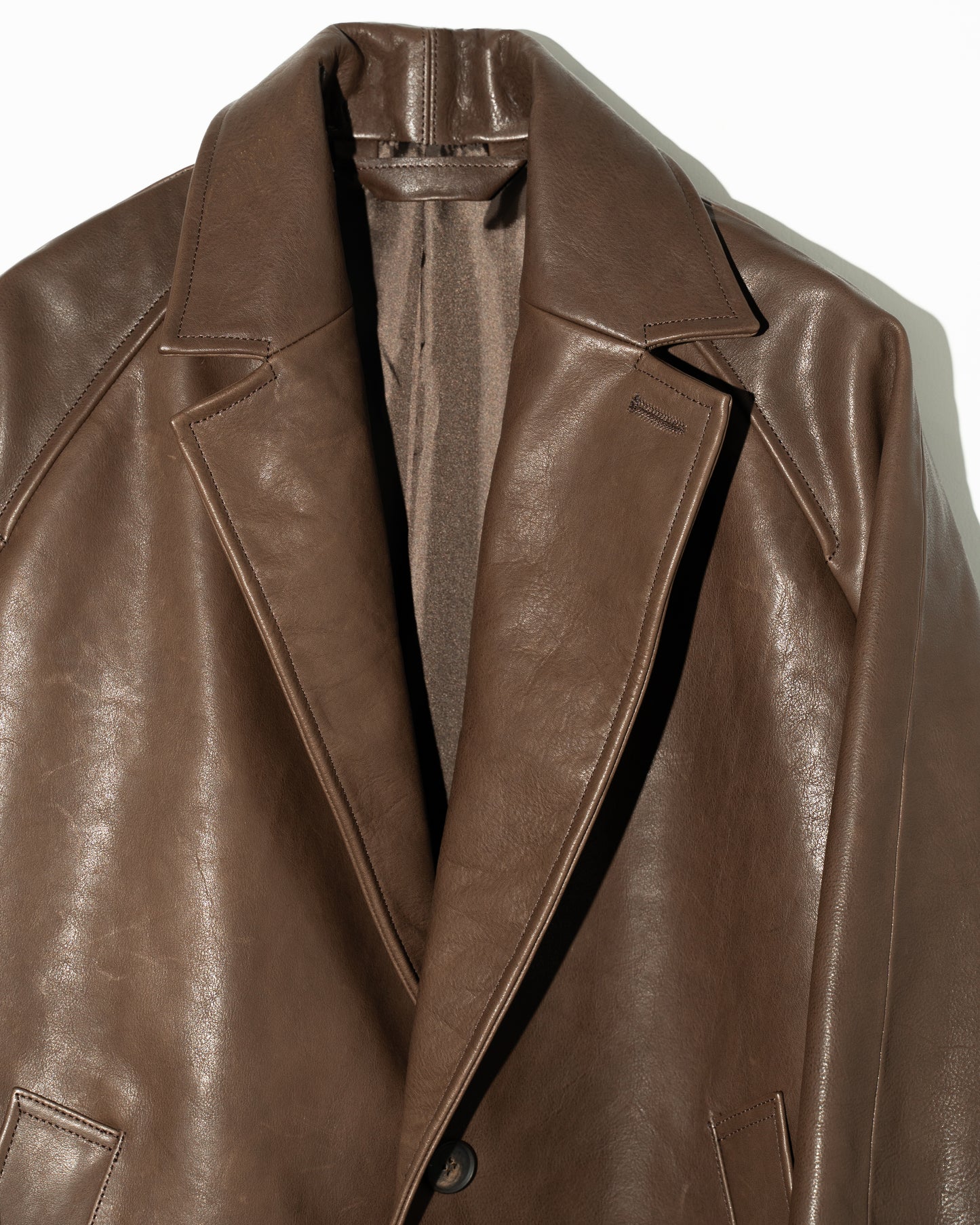 SHRINK LEATHER OVERSIZE RAGLAN JACKET - BROWN