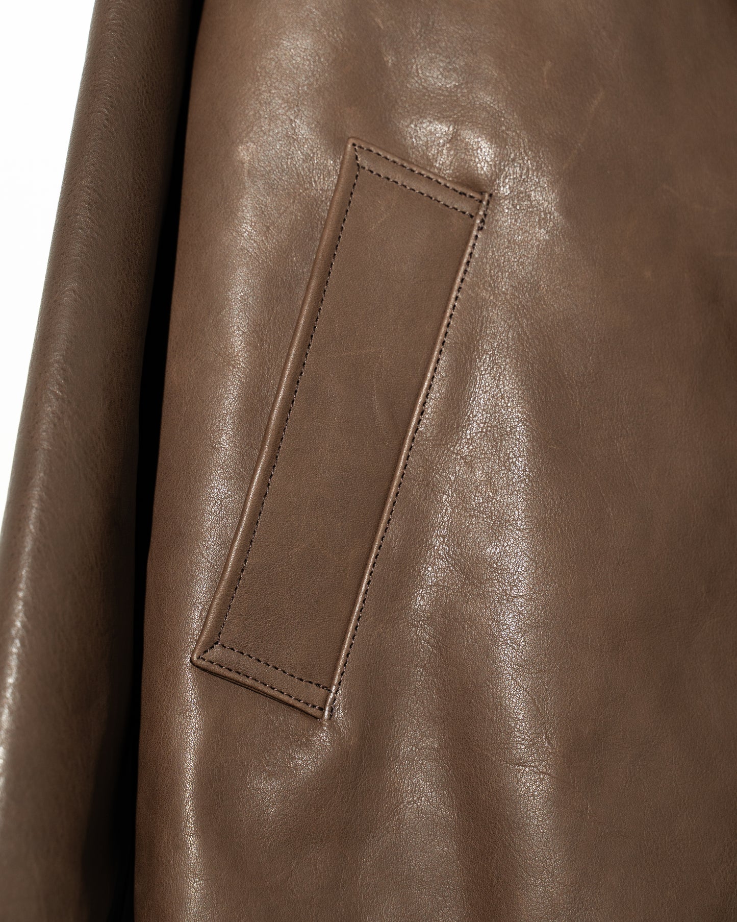 SHRINK LEATHER OVERSIZE RAGLAN JACKET - BROWN